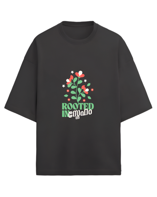 Black crew neck t-shirt with the text 'ROOTED LOVE" and floral graphics printed on the front.